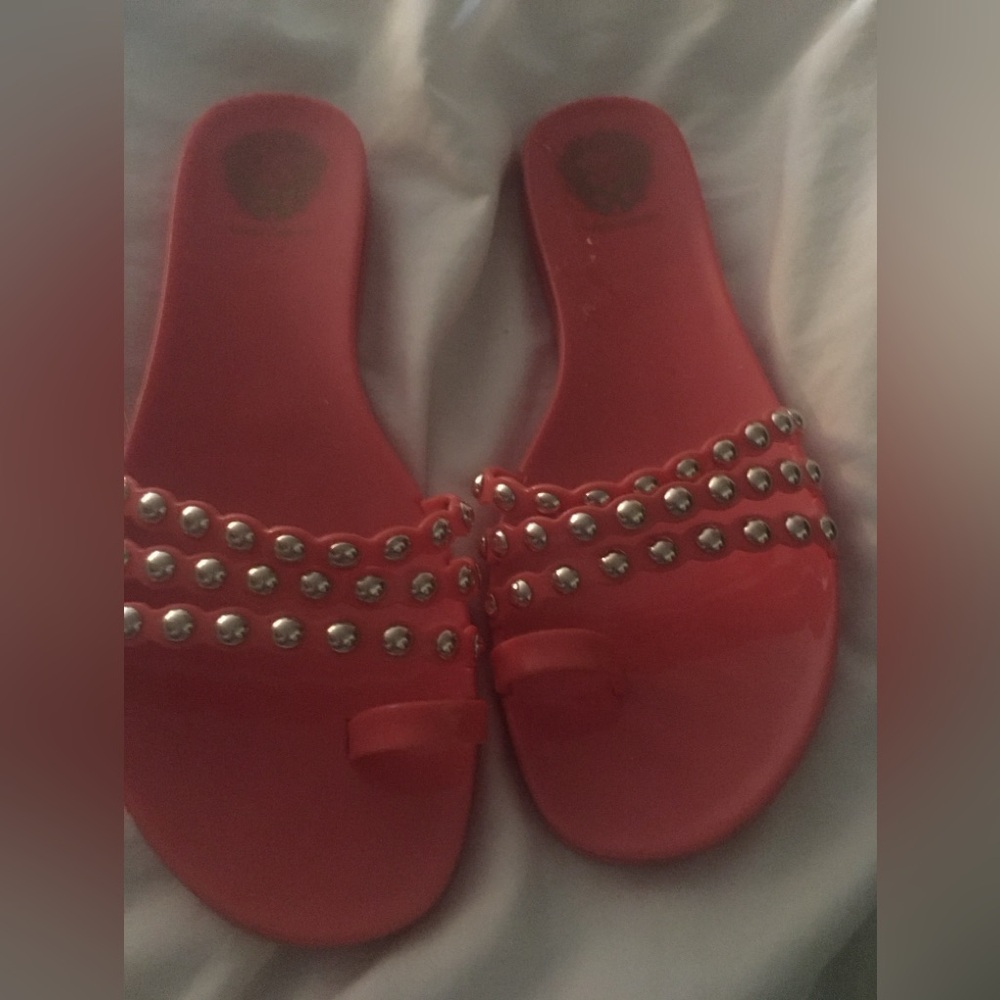 Orange flat jelly sandals…